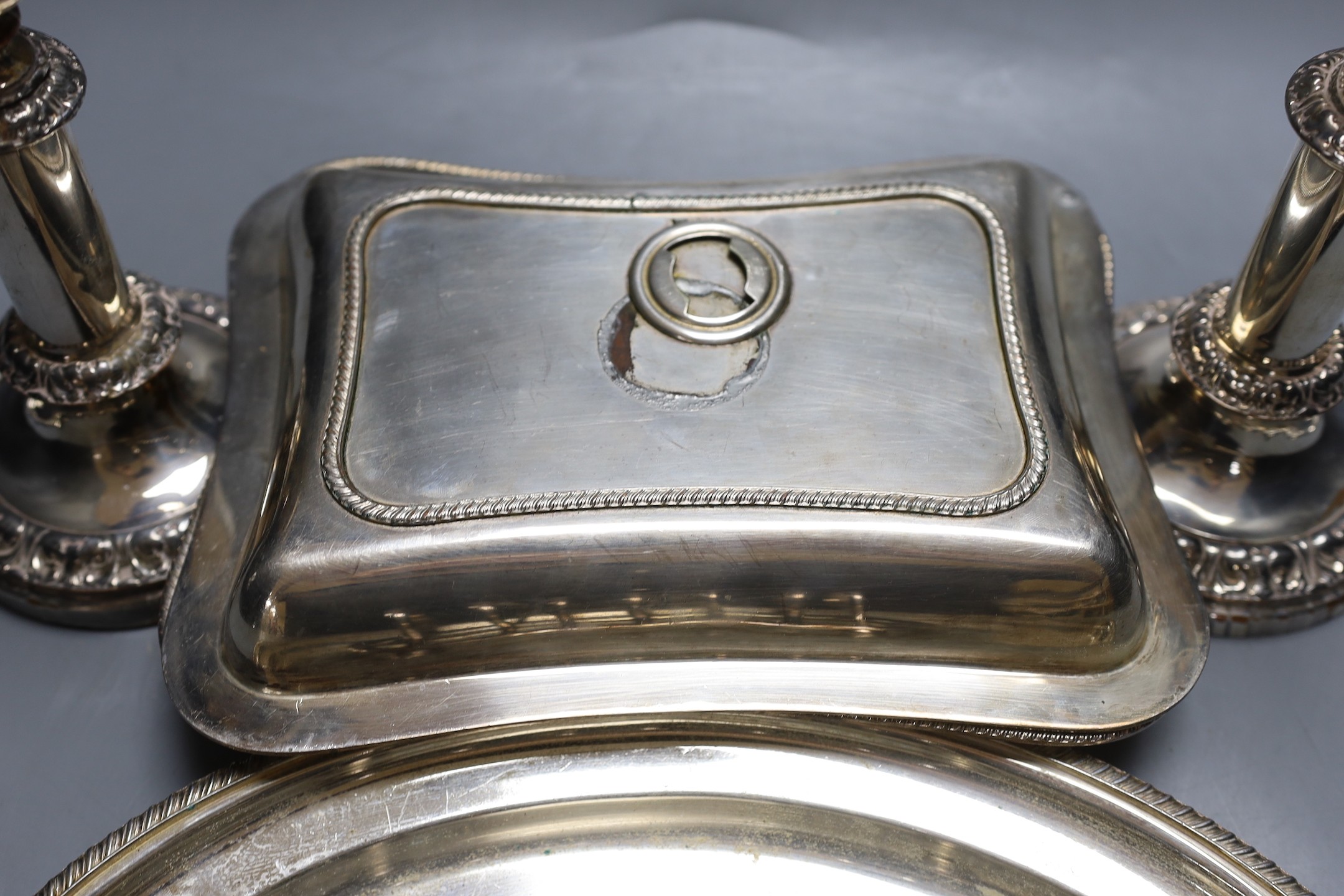 Plated wares to include a pair of telescopic candlesticks, toast rack and entree dishes